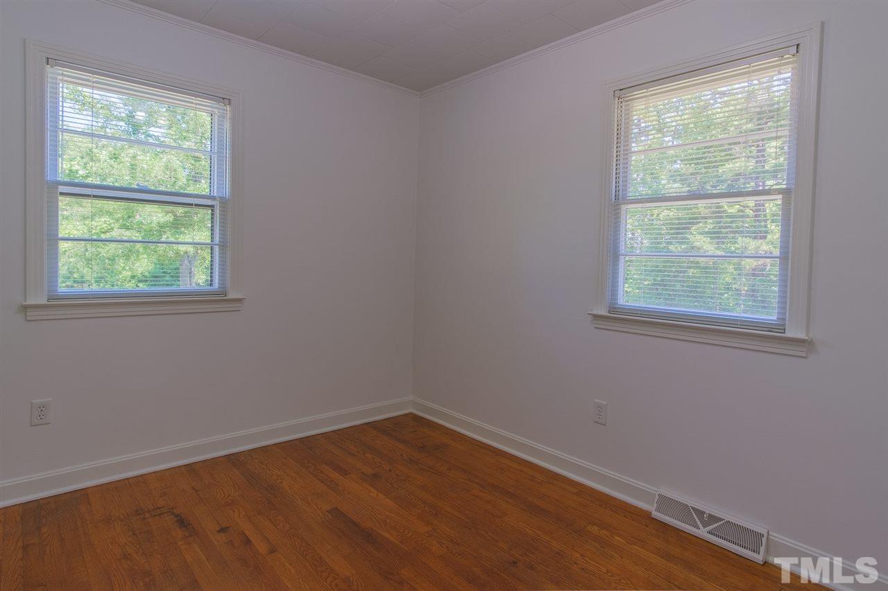 1301 Royster Clay Road Roxboro, NC 27574 - Photo 19 of 30 an empty room with a window