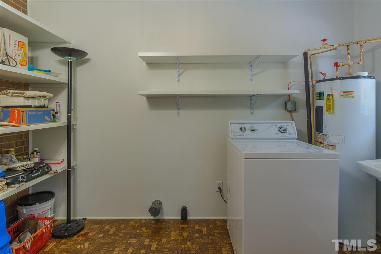 1301 Royster Clay Road Roxboro, NC 27574 - Photo 21 of 30 a utility room with dryer and washer