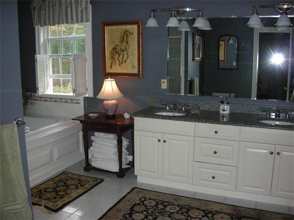 17 B Old Topsfield Road Boxford, MA 01921 - Photo 11 of 29 a bathroom with a sink a vanity and a mirror