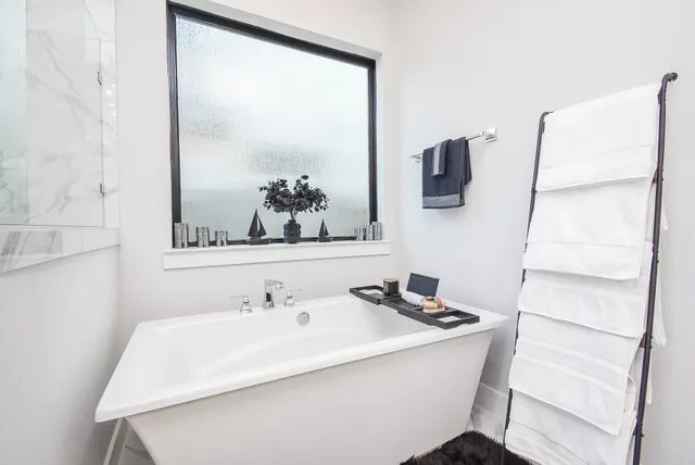 a bathroom with a sink and mirror