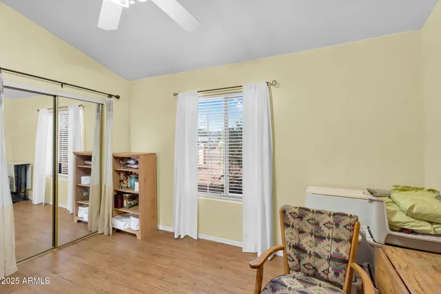 a work room with furniture and a chandelier