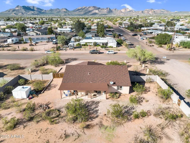 a view of a backyard of a house
