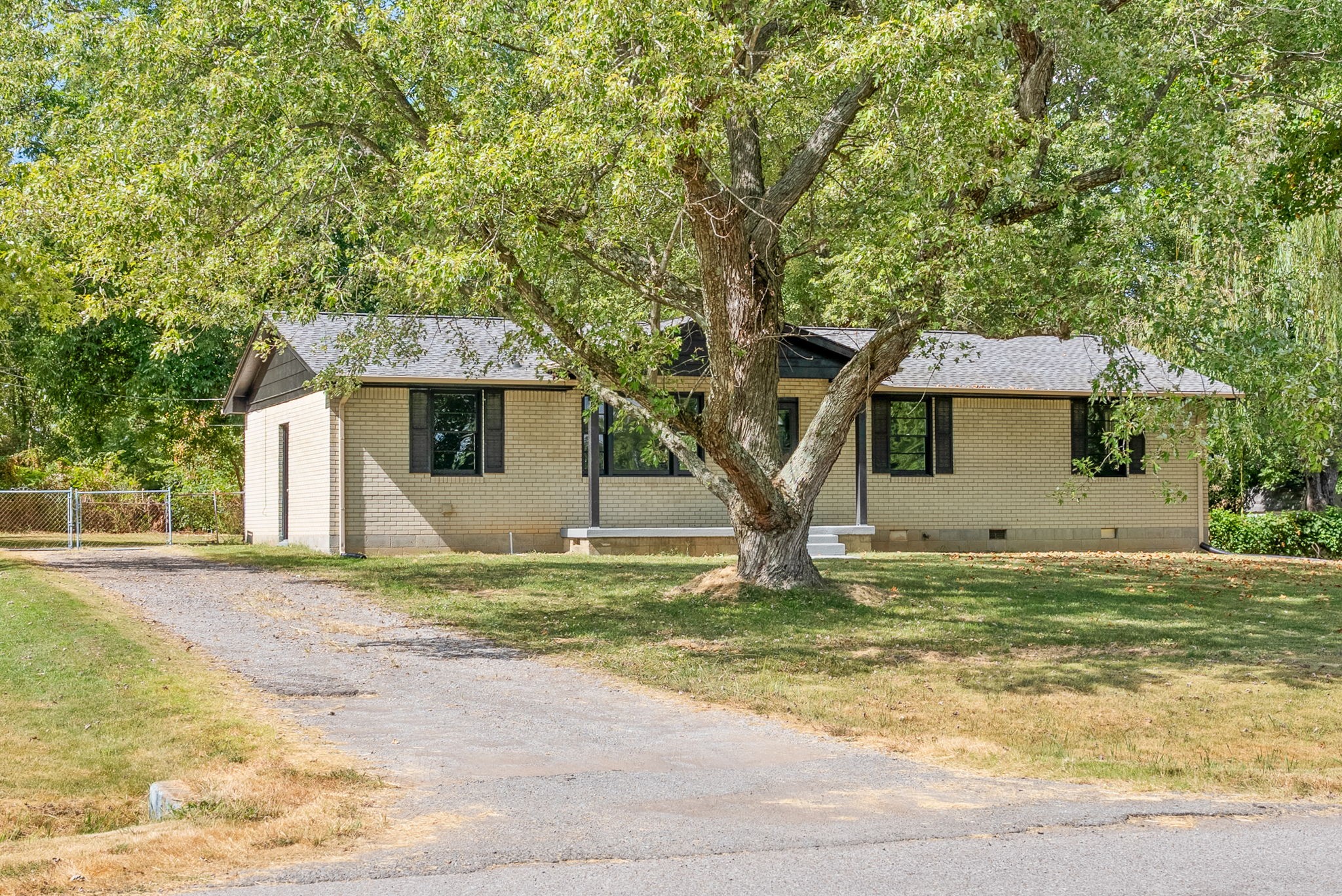 511 Ruby Drive Clarksville, TN 37040 - Photo 28 of 28 a view of a house with a yard and large tree