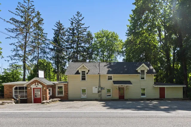 front view of a house with a street