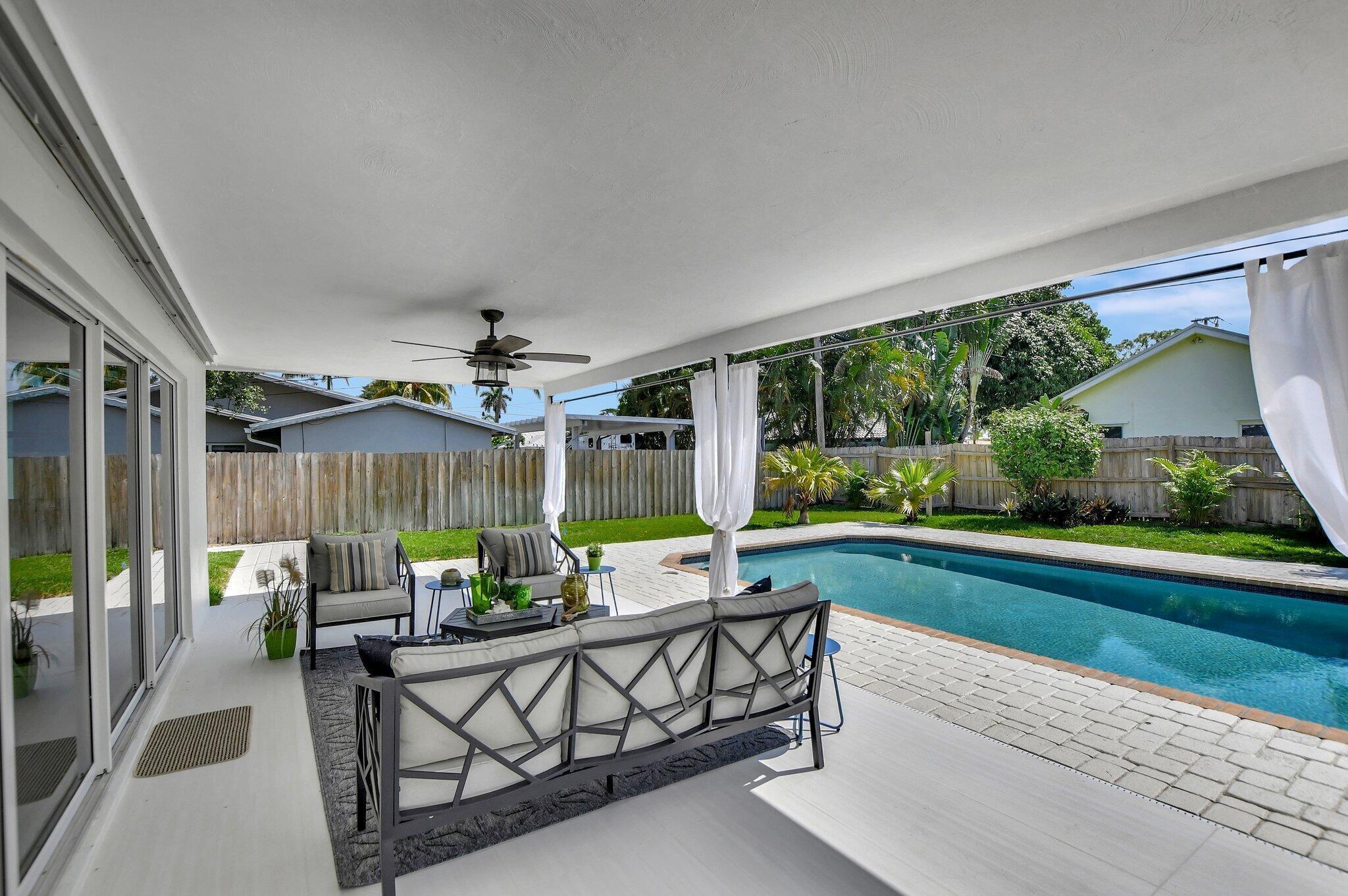 832 Southwest 10th Avenue Boca Raton, FL 33486 - Photo 35 of 57 a outdoor space with furniture and garden view