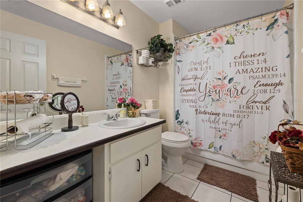 6907 Log Jam Court Ocoee, FL 34761 - Photo 16 of 30 a bathroom with a sink and a mirror