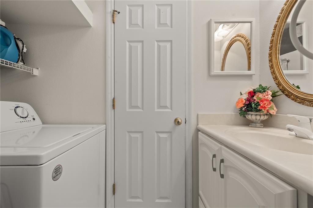 6907 Log Jam Court Ocoee, FL 34761 - Photo 23 of 30 a utility room with dryer and washer