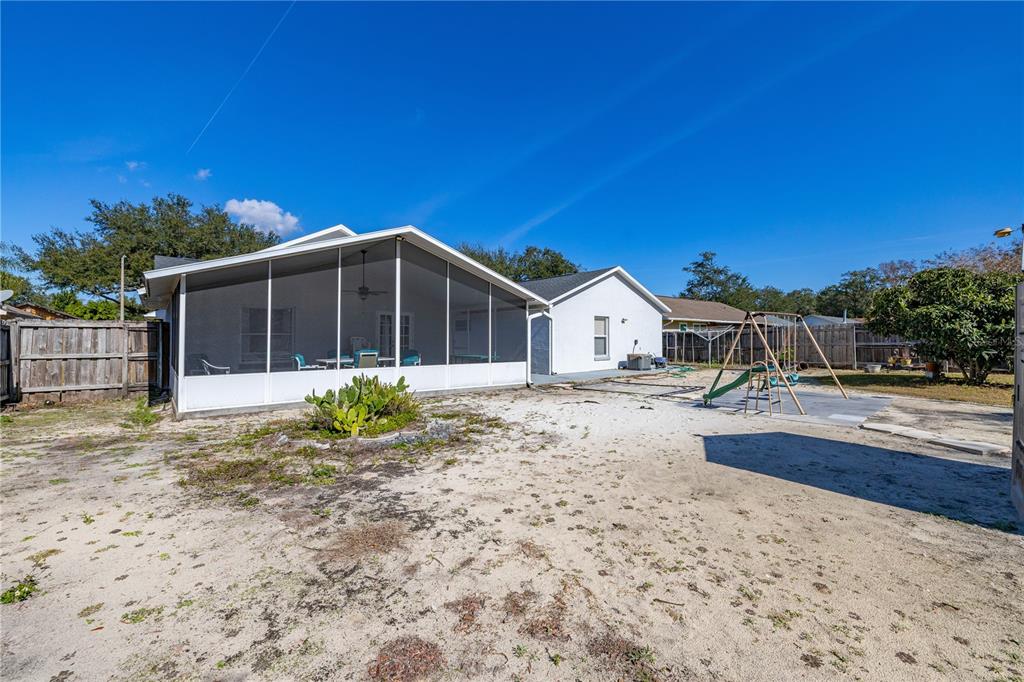 6907 Log Jam Court Ocoee, FL 34761 - Photo 26 of 30 a view of house with backyard space and balcony