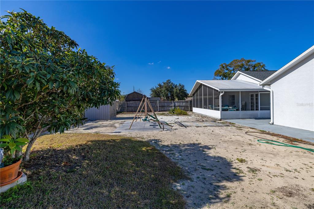 6907 Log Jam Court Ocoee, FL 34761 - Photo 27 of 30 a view of a house with backyard and sitting area