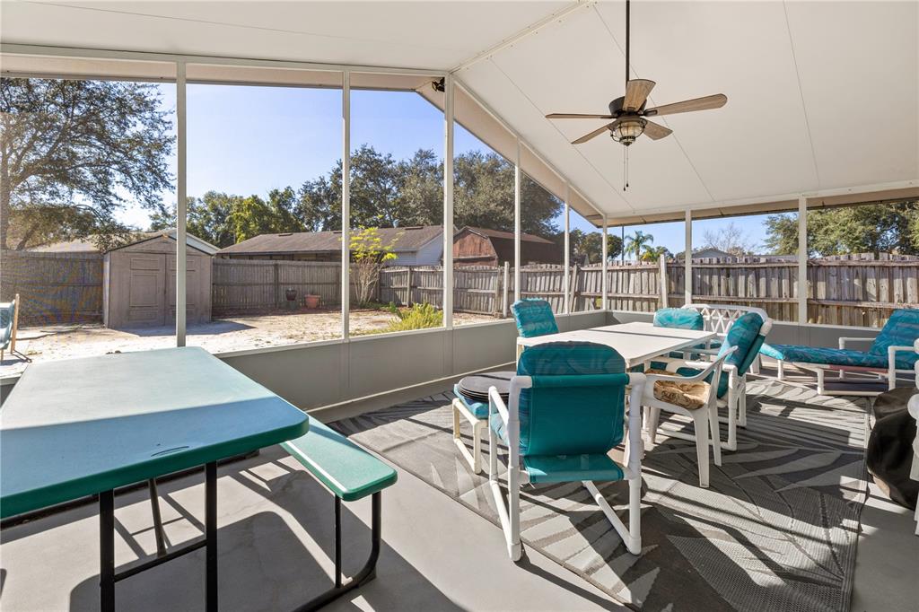6907 Log Jam Court Ocoee, FL 34761 - Photo 9 of 30 a view of a dining room with furniture window and outside view