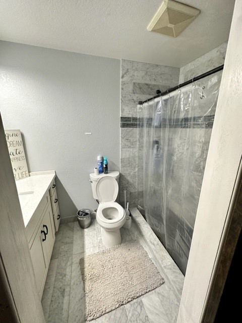 4121 Rice Street, Unit 402 Lihue, HI 96766 - Photo 19 of 20 a bathroom with a toilet and a shower