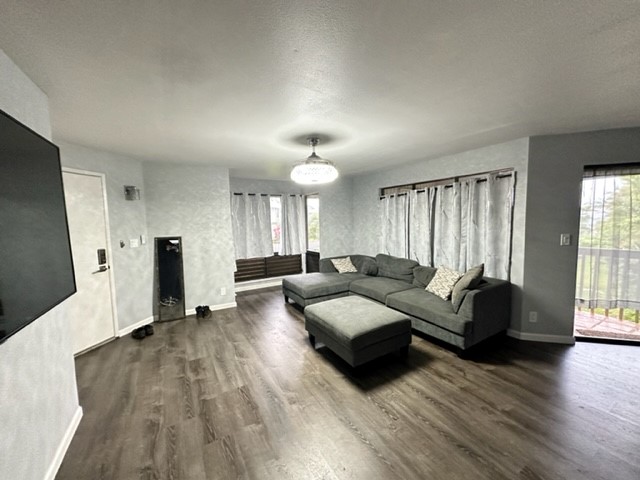 4121 Rice Street, Unit 402 Lihue, HI 96766 - Photo 4 of 20 a living room with furniture and a large window