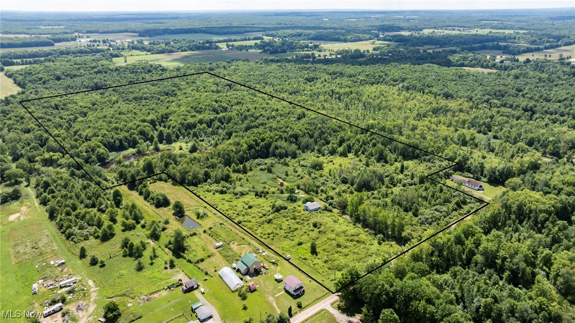 876 Clay Road Jefferson, OH 44047 - Photo 3 of 18 Aerial view of property and surrounding area featuring property boundaries highlighted