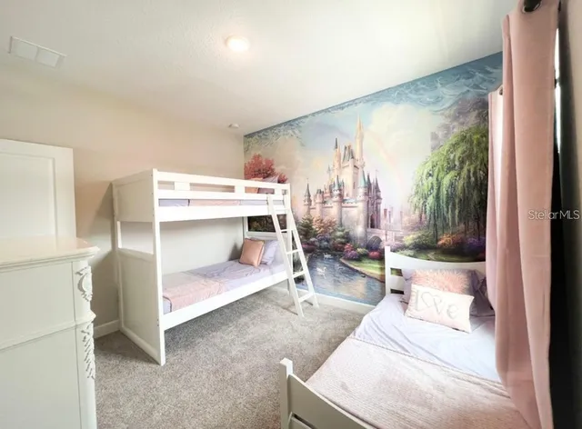 a living room with a couch and a table