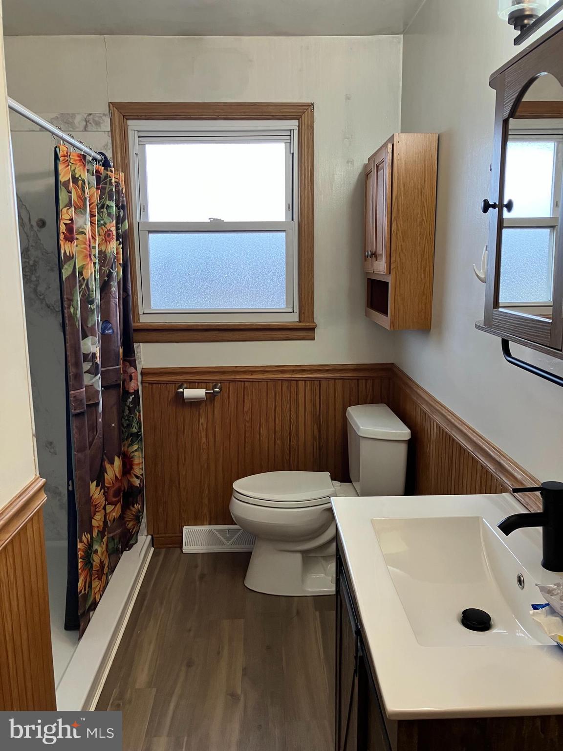 2019 Snyder Road Red Lion, PA 17356 - Photo 5 of 8 a bathroom with a sink a toilet and a mirror