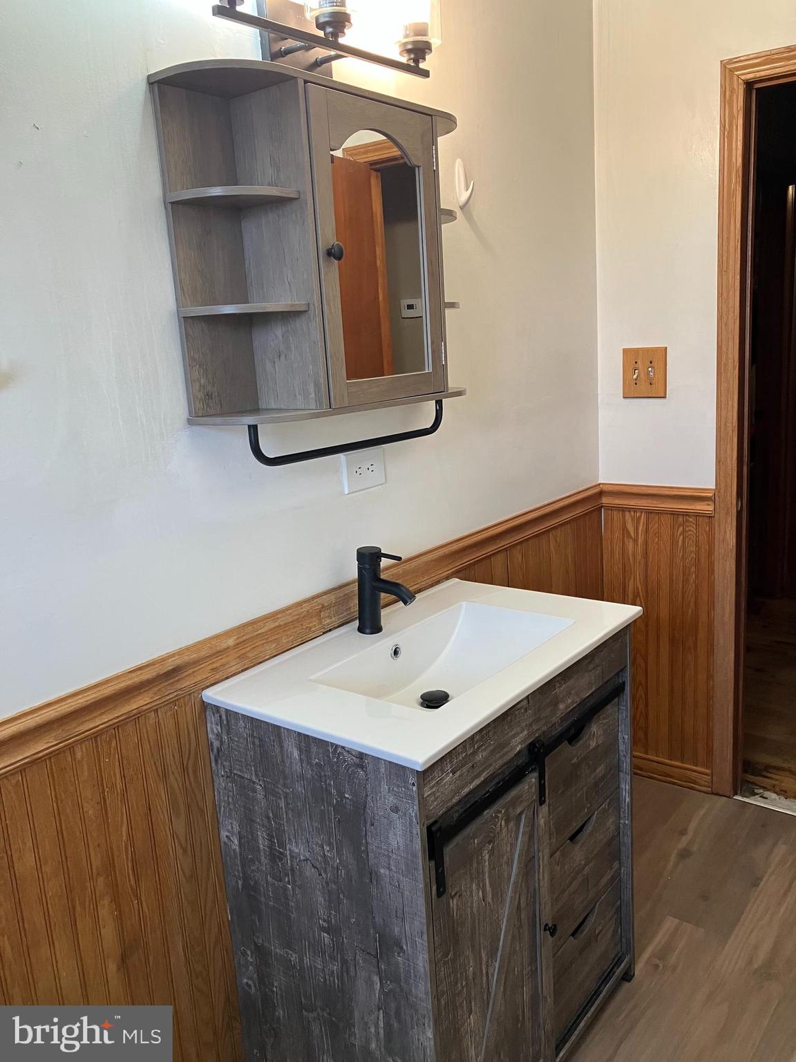 2019 Snyder Road Red Lion, PA 17356 - Photo 8 of 8 a bathroom with a sink and a mirror