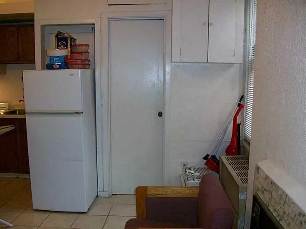 a room with storage and utility