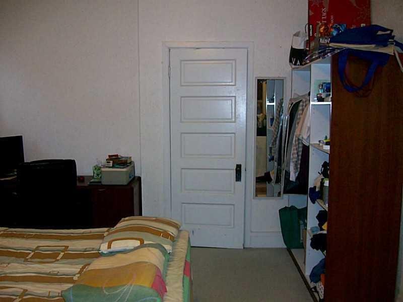 708 South Negley Avenue, Unit 4 Shadyside, PA 15232 - Photo 6 of 9 a bedroom with a bed and a closet