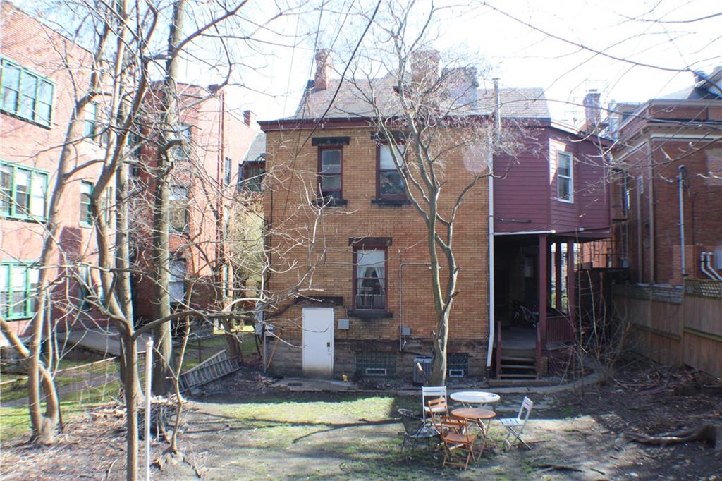 708 South Negley Avenue, Unit 4 Shadyside, PA 15232 - Photo 9 of 9 a front view of a house with a yard