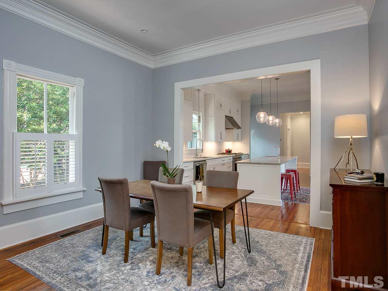223 Elm Street Raleigh, NC 27601 - Photo 14 of 30 a view of a dining room with furniture and a window