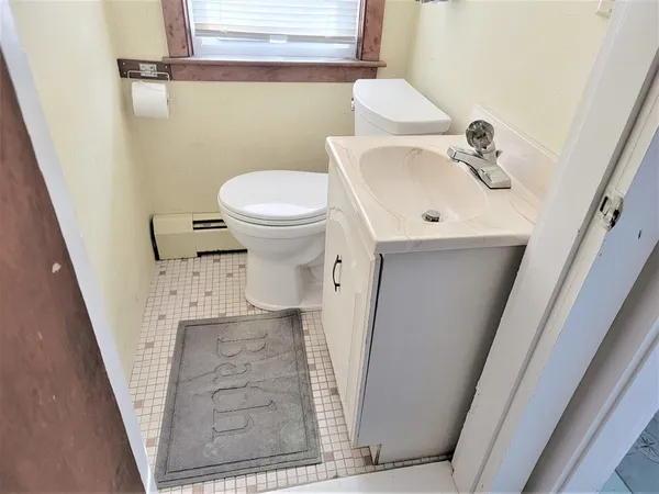 a bathroom with a sink and toilet