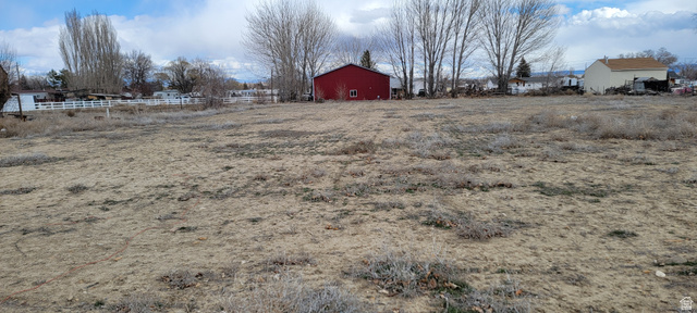 View of the lot and the neighbor behind the lot