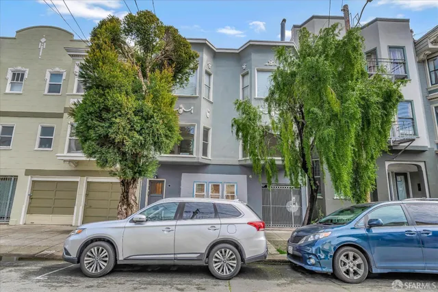 a car parked in front of a house