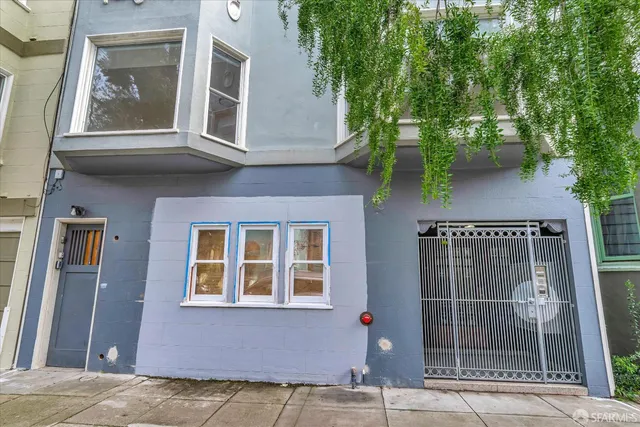 a view of a building with a door of the house