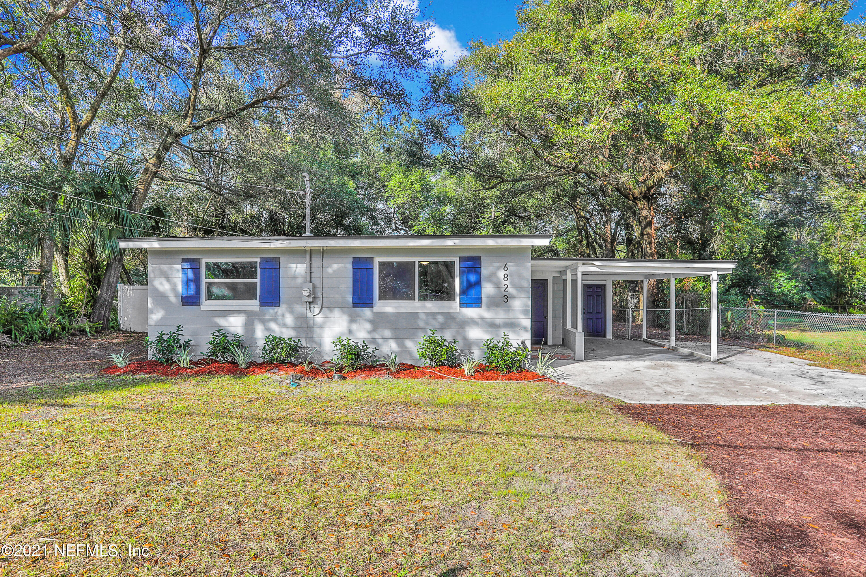 6823 Morgana Road North Jacksonville, FL 32211 - Photo 2 of 23 front view of a house with a yard