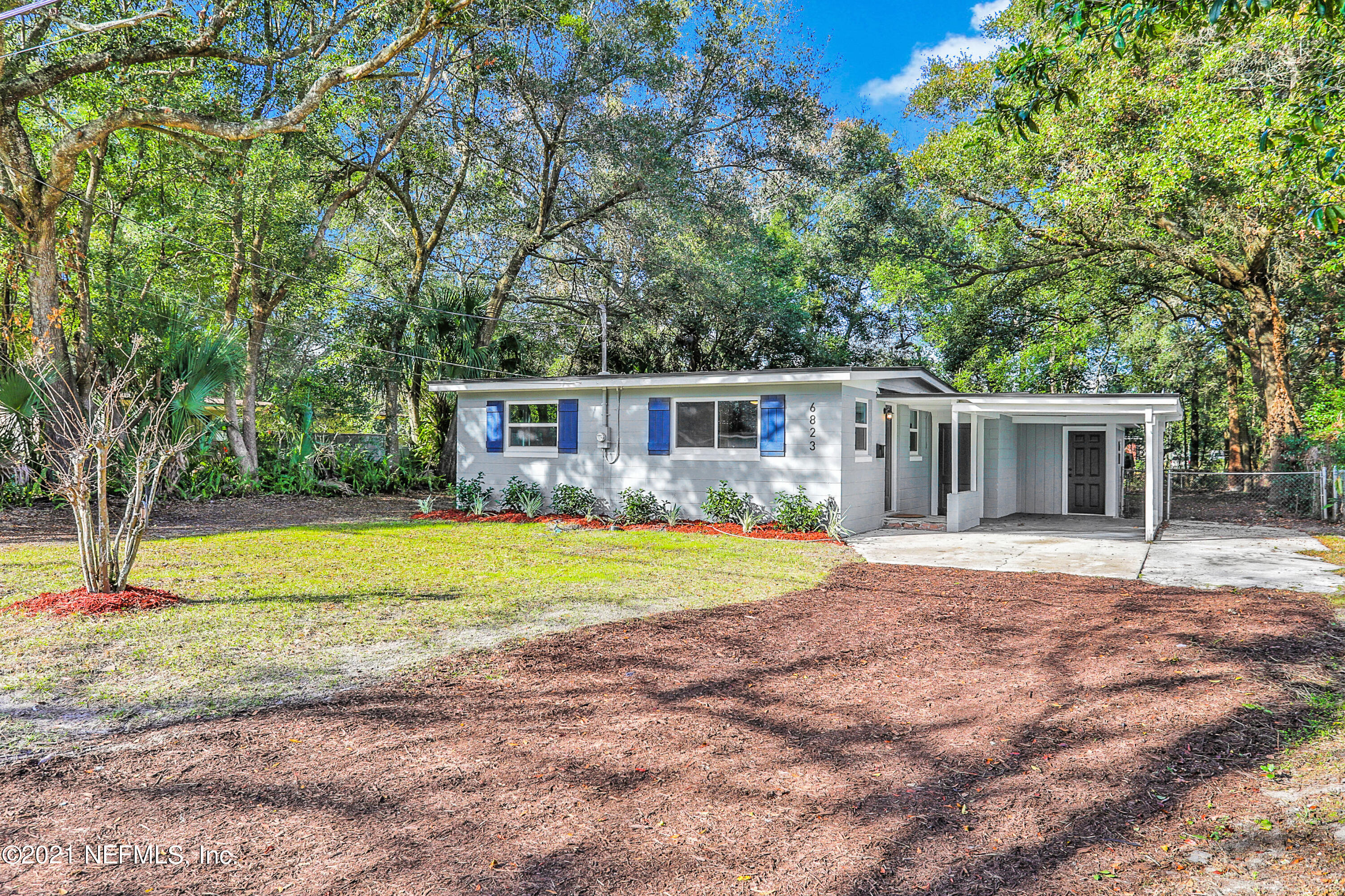 6823 Morgana Road North Jacksonville, FL 32211 - Photo 3 of 23 a house with swimming pool in front of it