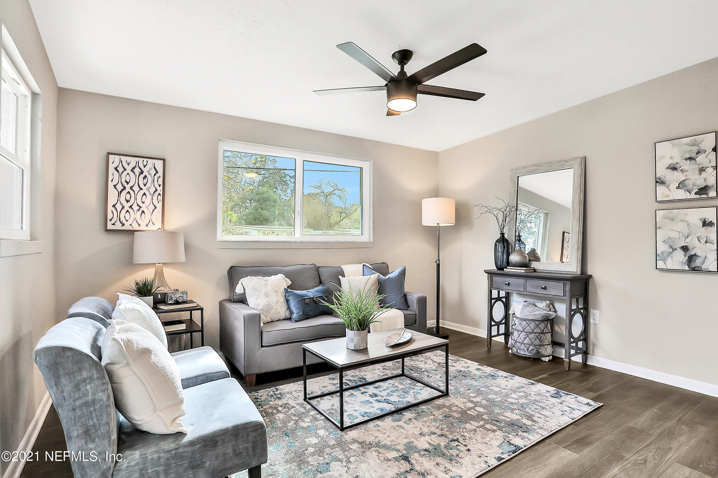6823 Morgana Road North Jacksonville, FL 32211 - Photo 6 of 23 a living room with furniture and a window