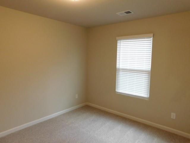 343 Indian Lake Trail Villa Rica, GA 30180 - Photo 11 of 29 an empty room with a window