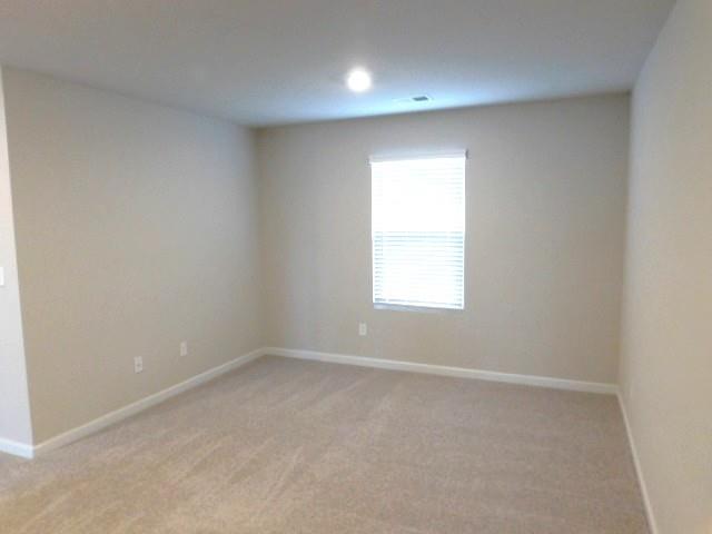 343 Indian Lake Trail Villa Rica, GA 30180 - Photo 15 of 29 an empty room with a window