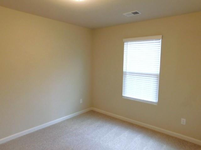 343 Indian Lake Trail Villa Rica, GA 30180 - Photo 17 of 29 an empty room with a window