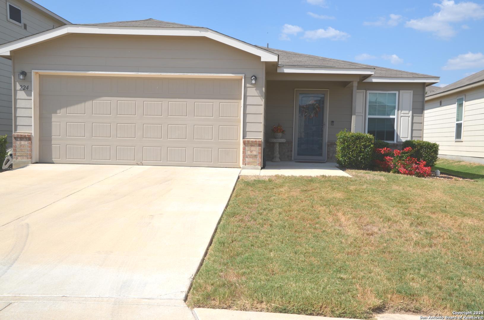 224 Mistflower New Braunfels, TX 78130 - Photo 1 of 1 a front view of a house with swing