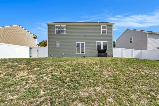 a front view of house with yard