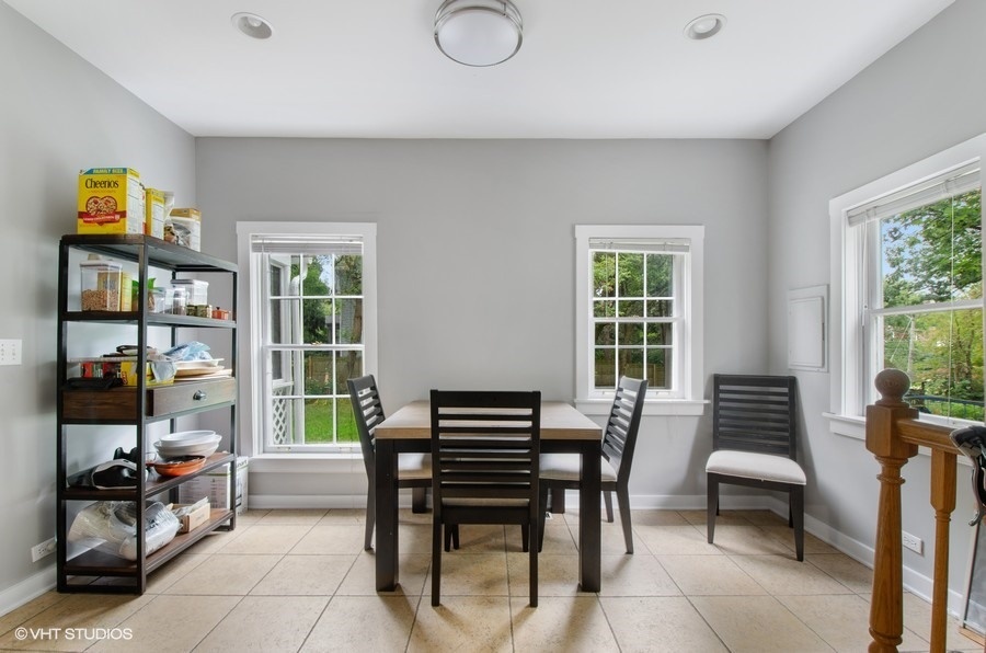 2404 Ridge Avenue Evanston, IL 60201 - Photo 13 of 22 a view of a workspace with furniture and a window