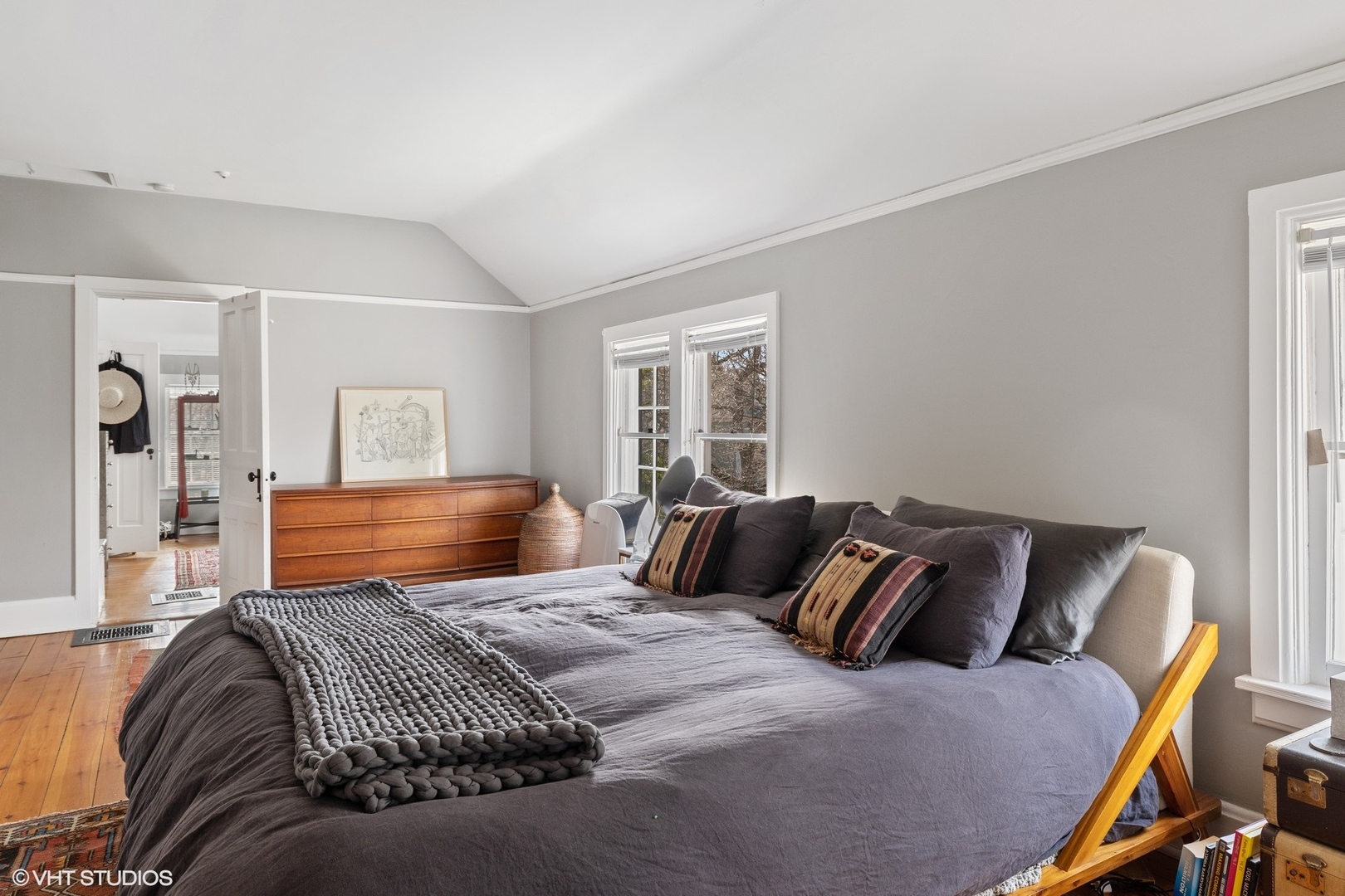 2404 Ridge Avenue Evanston, IL 60201 - Photo 15 of 22 a bedroom with a bed and wooden floor
