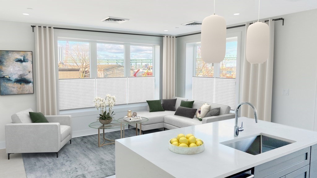 301 Border Street, Unit 612 Boston, MA 02128 - Photo 19 of 32 a living room with furniture and a large window