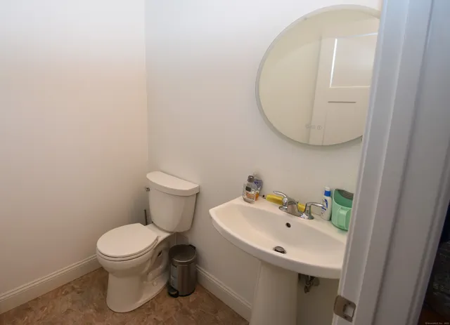 a bathroom with a sink and a toilet