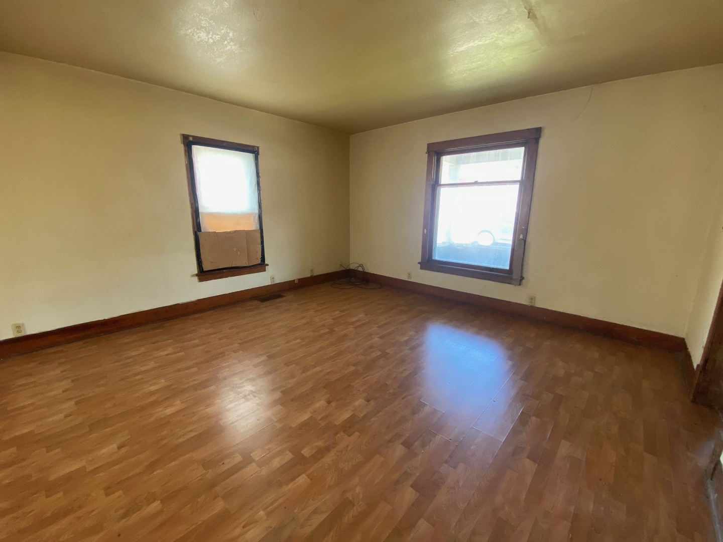 330 West Everett Street Dixon, IL 61021 - Photo 13 of 34 a view of an empty room with wooden floor and a window