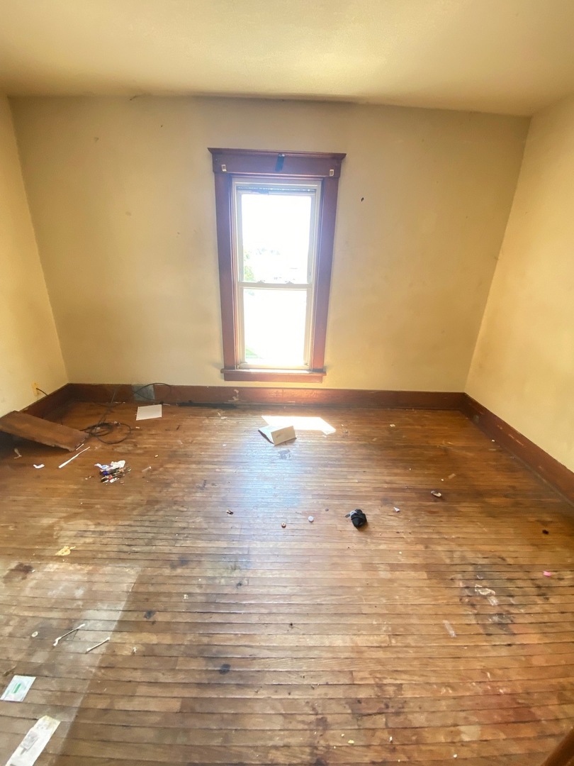 330 West Everett Street Dixon, IL 61021 - Photo 19 of 34 a view of an empty room and window