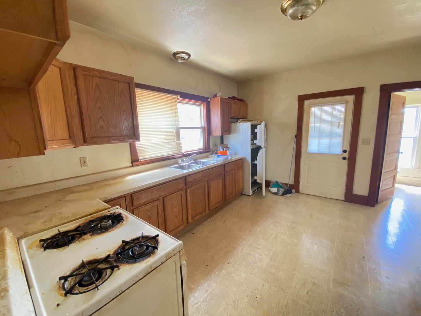 330 West Everett Street Dixon, IL 61021 - Photo 5 of 34 a kitchen with a stove and a sink