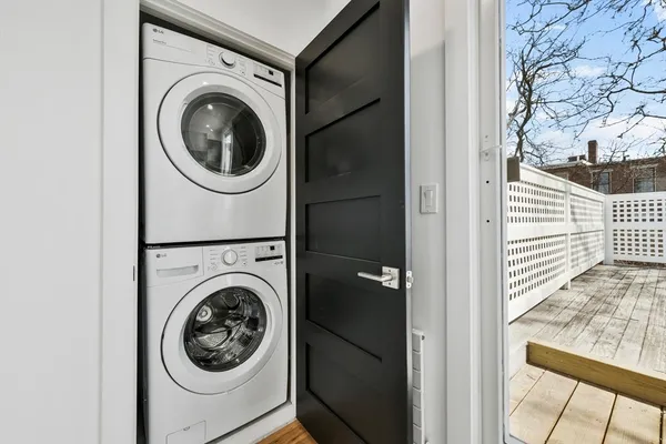 a utility room with dryer and washer