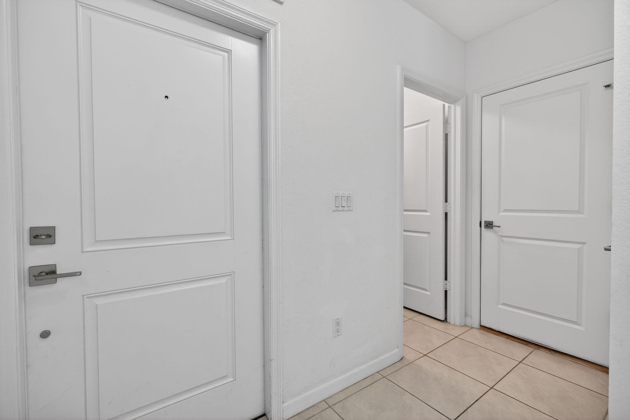 6814 Mitchell Street Jupiter, FL 33458 - Photo 2 of 49 a view of a closet area with hallway