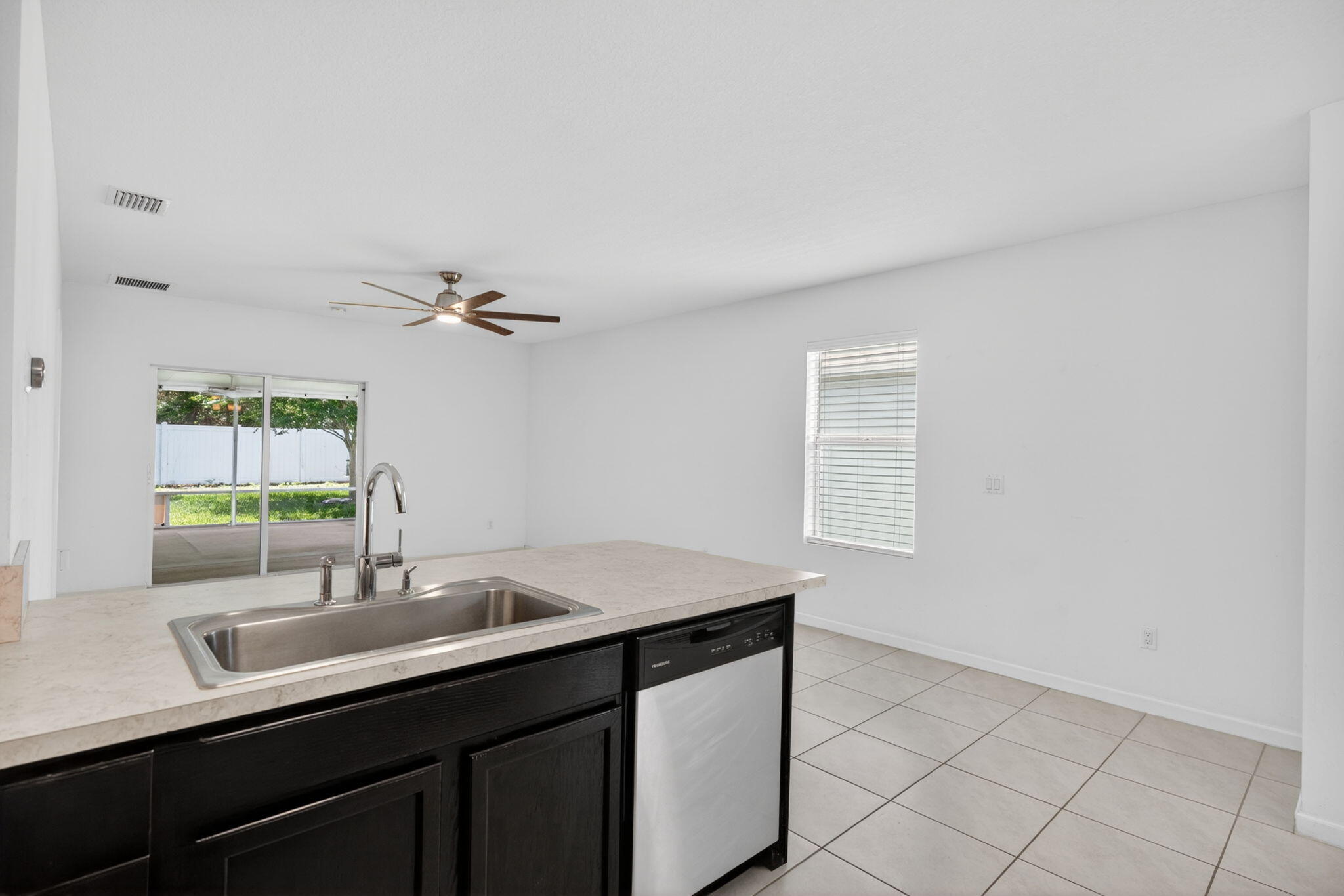 6814 Mitchell Street Jupiter, FL 33458 - Photo 21 of 49 a bathroom with a sink a vanity and mirror