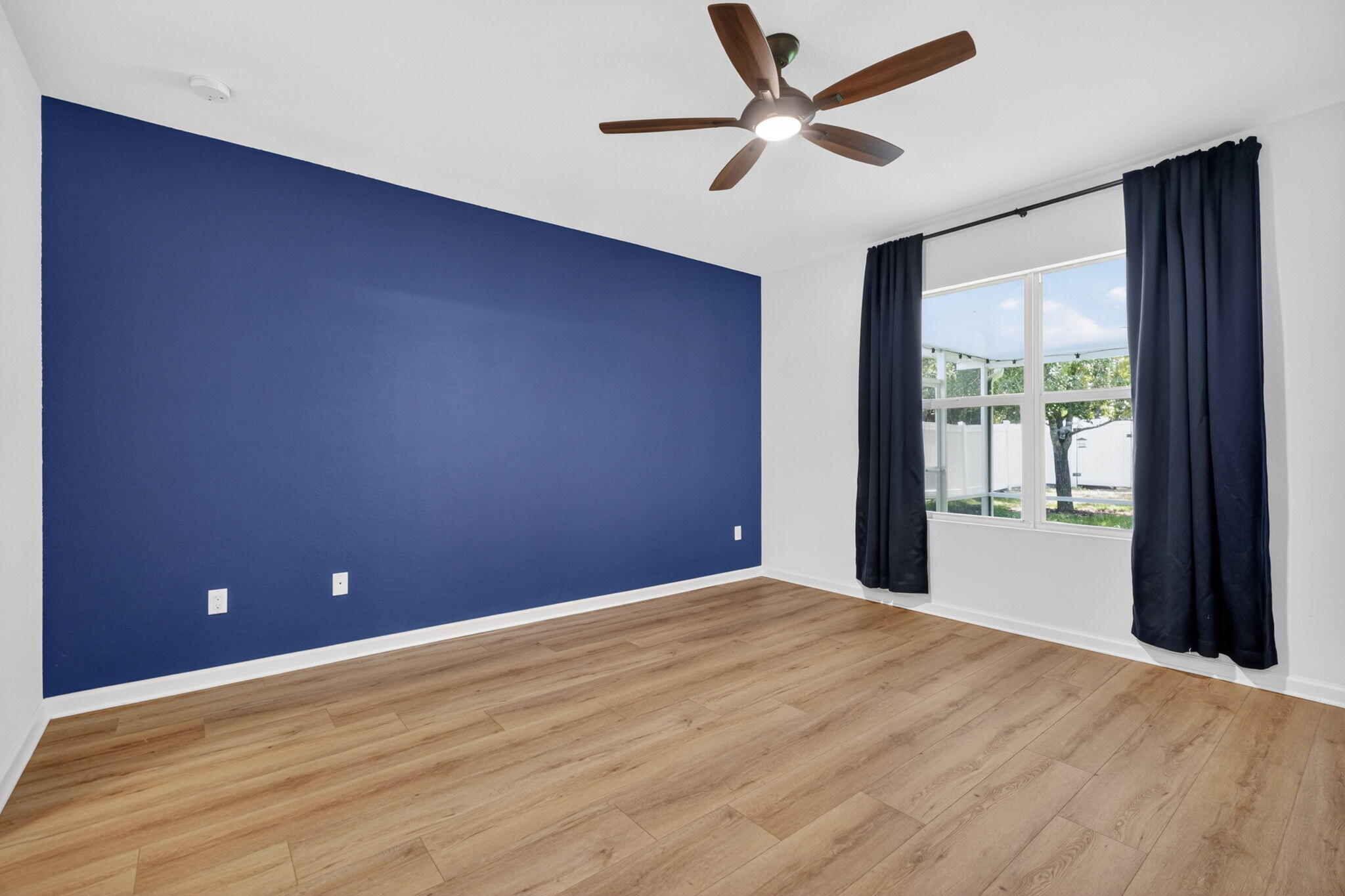 6814 Mitchell Street Jupiter, FL 33458 - Photo 27 of 49 a view of an empty room with a window