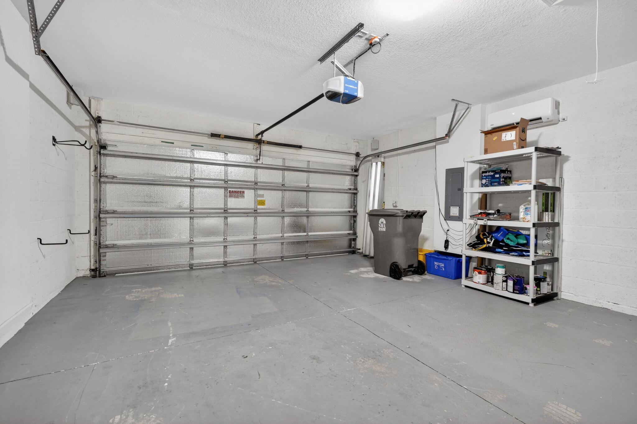 6814 Mitchell Street Jupiter, FL 33458 - Photo 46 of 49 a view of a garage with storage