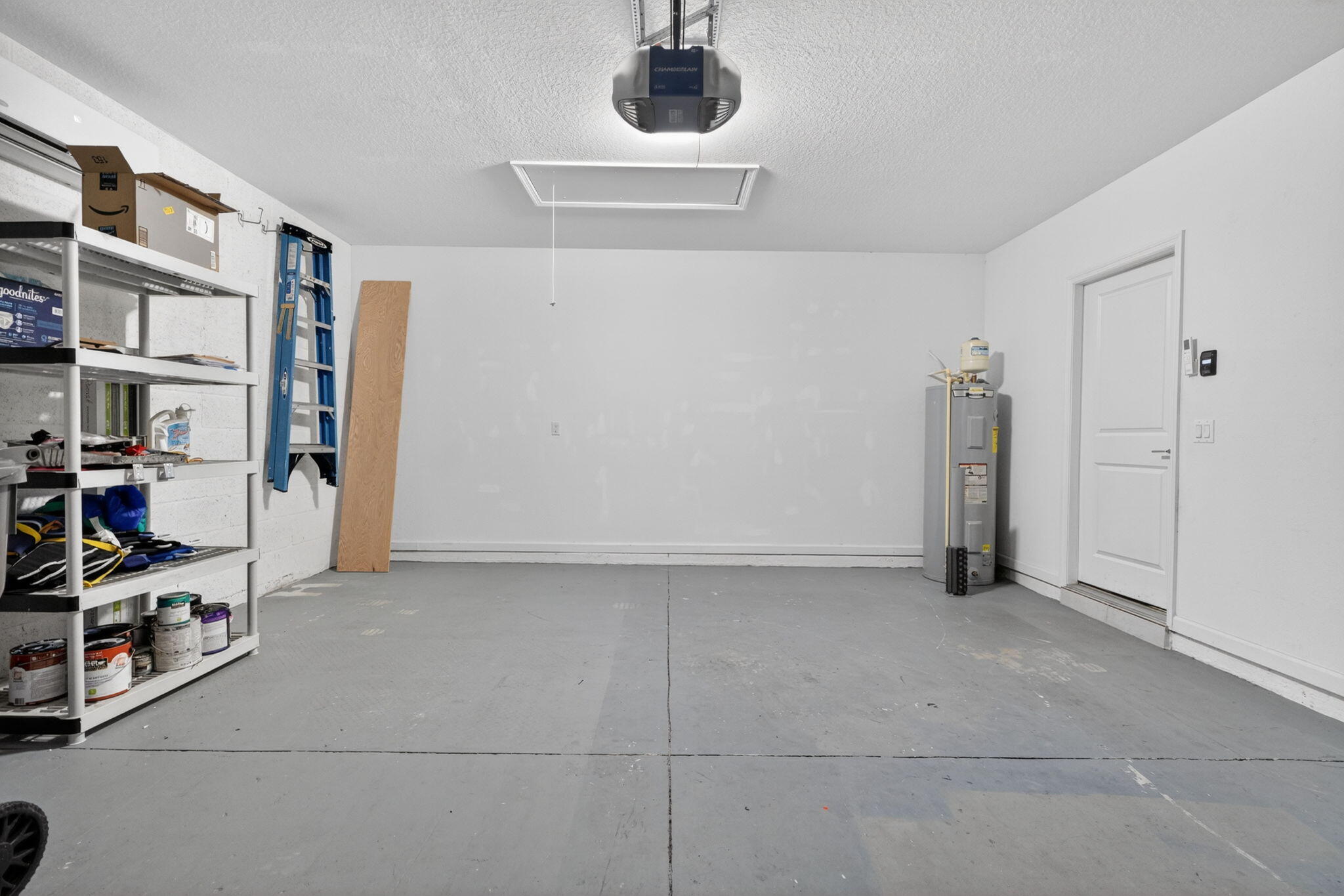 6814 Mitchell Street Jupiter, FL 33458 - Photo 47 of 49 a view of an empty room and shelves