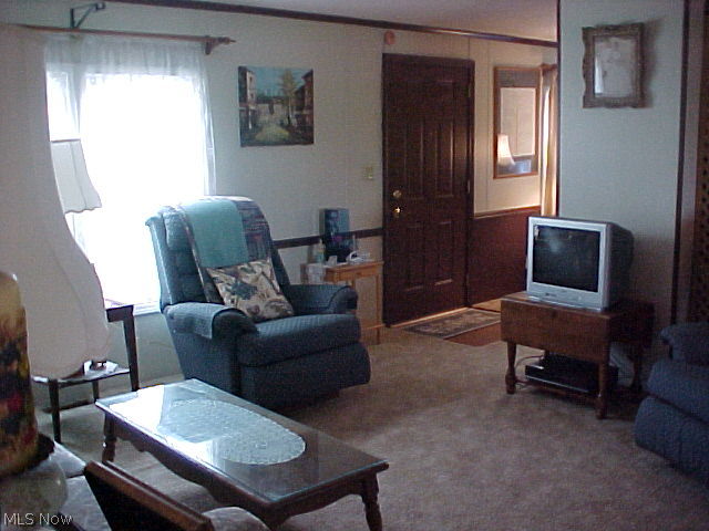 Nice size living room.  Home faces East.